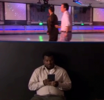 Darryl reads his Kobo with Dwight and Andy at the skating rink on the Office