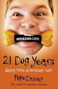Book cover - man with dog bone in mouth - 21 Dog Years - Doing Time at Amazon by employee Mike Daisey
