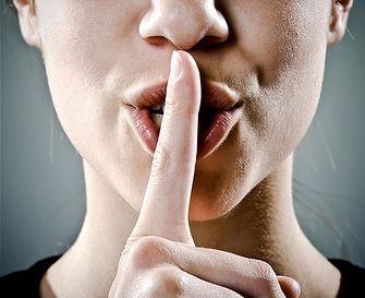 shh - finger to lips - secret rumor